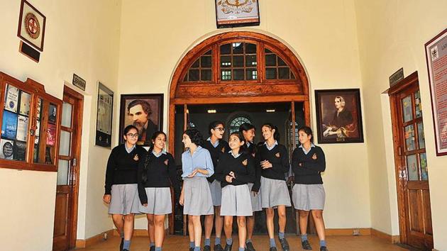 Students of The Lawrence School, Sanawar, coming out of the library, with the portraits of Sir Henry Lawrence and his wife Lady Honoria Lawrence on either side.(HT Photo)