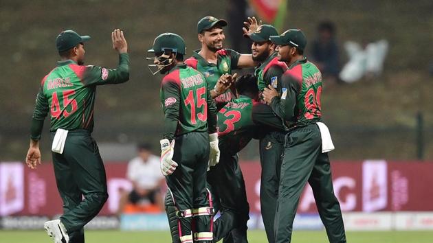 Bangladesh Nazmul Islam celebrates with his team after he dismissed Afghanistan batsman Rahmat Shah during the one day international (ODI) Asia Cup cricket match between Afghanistan and Bangladesh at The Sheikh Zayed Stadium in Abu Dhabi on September 23, 2018. (Photo by GIUSEPPE CACACE / AFP) (AFP) Bangladesh Nazmul Islam celebrates with his team after he dismissed Afghanistan batsman Rahmat Shah during the one day international (ODI) Asia Cup cricket match between Afghanistan and Bangladesh at The Sheikh Zayed Stadium in Abu Dhabi on September 23, 2018. (Photo by GIUSEPPE CACACE / AFP) (AFP)