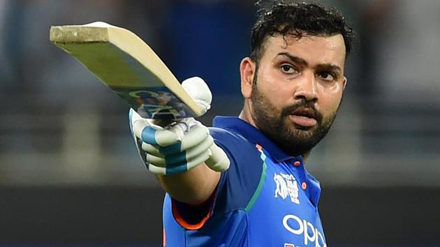 Rohit Sharma celebrates after scoring his century against Pakistan. (AFP)