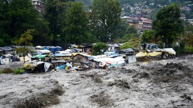 The swollen Beas in Kullu. Schools in at least nine of 12 districts of Himachal will remain closed on Monday after rain and snowfall lashed many parts of the state.(Aqil Khan/ HT Photo)