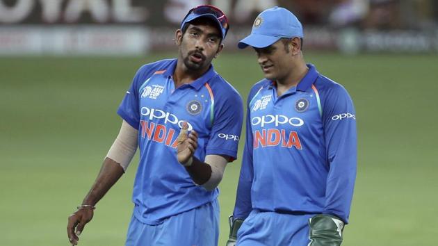 India's Jasprit Bumrah, left, interacts with teammate India's Mahendra Singh Dhoni. (AP) India's Jasprit Bumrah, left, interacts with teammate India's Mahendra Singh Dhoni. (AP)