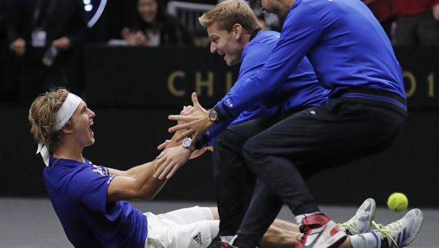 Team Europe's Alexander Zverev, left, celebrates with teammates David Goffin, center, and Grigor Dimitrov after defeating Team World's Kevin Anderson during a men's singles tennis match to win the Laver Cup(AP) Team Europe's Alexander Zverev, left, celebrates with teammates David Goffin, center, and Grigor Dimitrov after defeating Team World's Kevin Anderson during a men's singles tennis match to win the Laver Cup(AP)