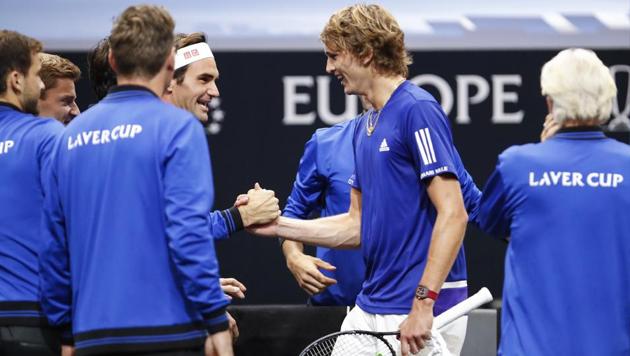 Team Europe's Alexander Zverev, second from right, is congratulated by Roger Federer at Laver Cup 2018.(AP)
