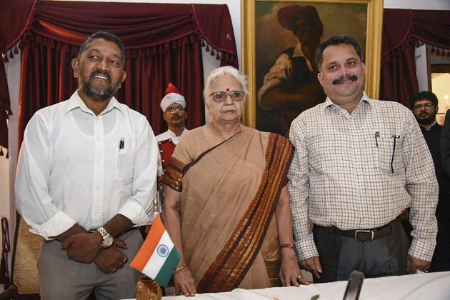 Goa Governor Mridula Sinha flanked by newly sworn-in BJP ministers Milind Naik (L) and Nilesh Cabral(PTI)