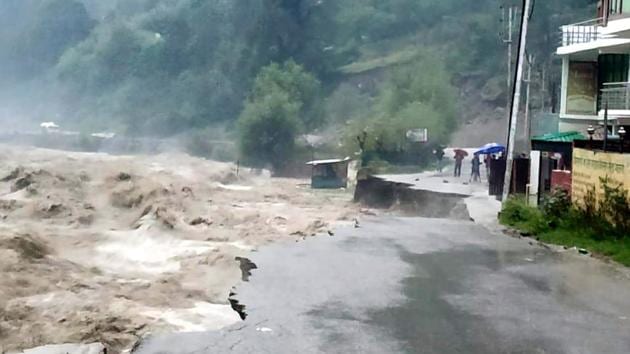A raging River Beas washes away the Kullu-Manali highway due to incessant rains, on Monday. (HT Photo) A raging River Beas washes away the Kullu-Manali highway due to incessant rains, on Monday. (HT Photo)