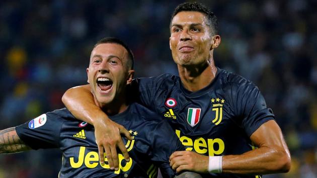 Juventus' Federico Bernardeschi celebrates scoring their second goal with Cristiano Ronaldo.(REUTERS)
