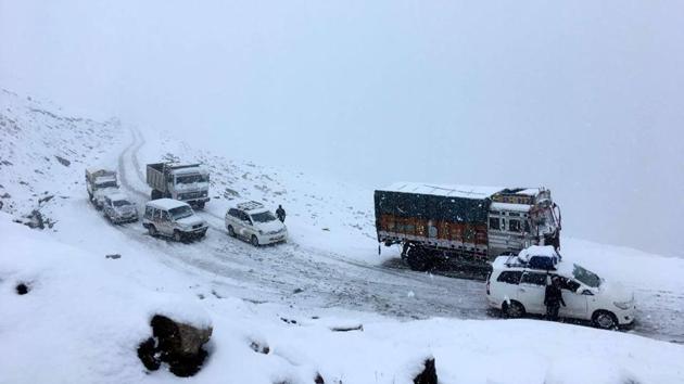 In tribal district of Lahaul and Spiti which has been snowed out, nine researchers, who had gone to 5,480-metre high Gangstang glacier have reportedly gone missing. (HT Photo)
