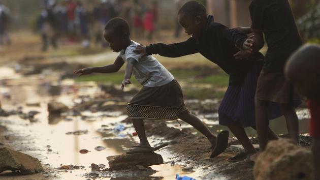 As the outbreak spreads beyond Harare, Zimbabweans see it as the new government’s first big test after a bitterly disputed election. Elizabeth Limamu, 66, told that she has lined a path of stones from the street to her home to avoid stepping in sewage that has pooled next to her yard, where some children play barefoot. On the other hand her neighbour locks her children inside as it’s not safe out. (Tsvangirayi Mukwazhi / AP) As the outbreak spreads beyond Harare, Zimbabweans see it as the new government’s first big test after a bitterly disputed election. Elizabeth Limamu, 66, told that she has lined a path of stones from the street to her home to avoid stepping in sewage that has pooled next to her yard, where some children play barefoot. On the other hand her neighbour locks her children inside as it’s not safe out. (Tsvangirayi Mukwazhi / AP)