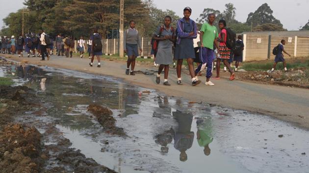 Photos: Raw sewage in Harare’s streets brings cholera outbreak to ...