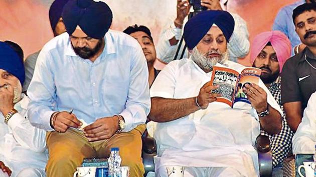 Shiromani Akali Dal president Sukhbir Singh Badal (centre) with party leaders during the annual political conference at Chhapar Mela in Ludhiana on Monday. (HT Photo) Shiromani Akali Dal president Sukhbir Singh Badal (centre) with party leaders during the annual political conference at Chhapar Mela in Ludhiana on Monday. (HT Photo)