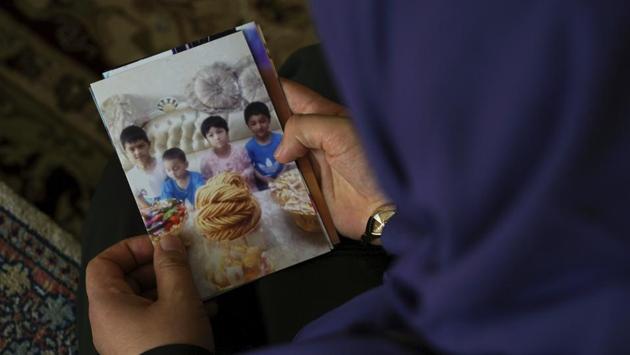 Every morning, Meripet wakes up to her nightmare: The Chinese government has turned four of her children into orphans, even though she and their father are alive. They left the kids with their grandmother at home in China when they went to nurse Meripet’s sick father in Turkey. But after Chinese authorities started locking up ethnic Uighurs for alleged subversive crimes such as travel abroad, a visit became exile. (Dake Kang / AP) 