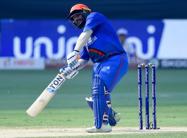 Afghan batsman Mohammad Shahzad plays a shot during the one day international (ODI) Asia Cup cricket match between Afghanistan and India. (AFP)