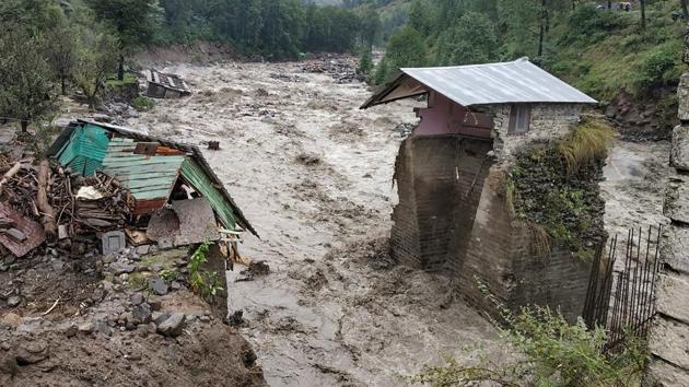 A swollen Beas river flows after heavy rains in the region, in Kullu district, Monday.(PTI)