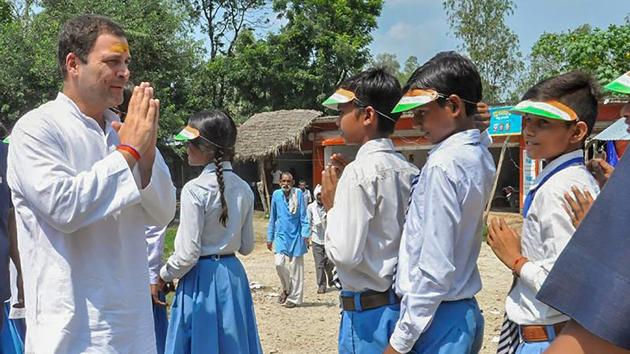 Congress president Rahul Gandhi meeting students on the first day of his two-day visit to Amethi.(PTI Photo)