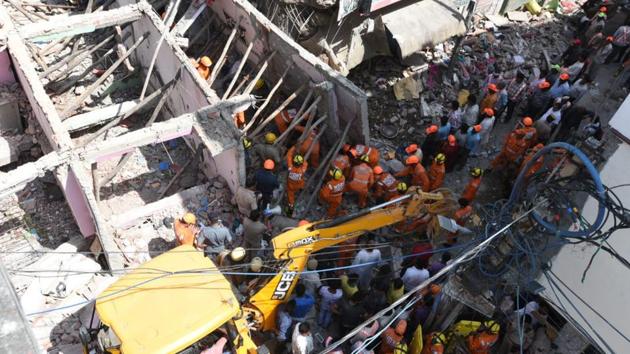 Four people, including three children, were killed in north Delhi’s Ashok Vihar when a three-storeyed house collapsed on Wednesday morning, police said. Seven others are injured in the accident that happened at 9 am. Official are also probing whether the building collapsed due to heavy rains that have lashed Delhi and other north Indian states these past few days. (Sonu Mehta / HT Photo) Four people, including three children, were killed in north Delhi’s Ashok Vihar when a three-storeyed house collapsed on Wednesday morning, police said. Seven others are injured in the accident that happened at 9 am. Official are also probing whether the building collapsed due to heavy rains that have lashed Delhi and other north Indian states these past few days. (Sonu Mehta / HT Photo)