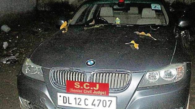 The second-hand BMW 5 series car that the engineer had bought. Stickers of judge was added to con people, said cops. (HT File Photo) The second-hand BMW 5 series car that the engineer had bought. Stickers of judge was added to con people, said cops. (HT File Photo)