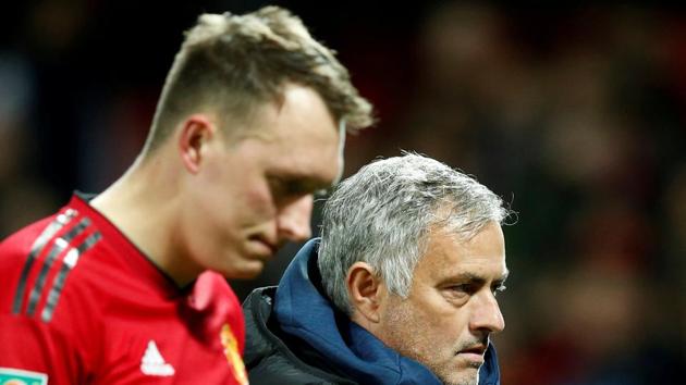 Phil Jones (L) missed what turned out to be decisive penalty. (REUTERS) Phil Jones (L) missed what turned out to be decisive penalty. (REUTERS)