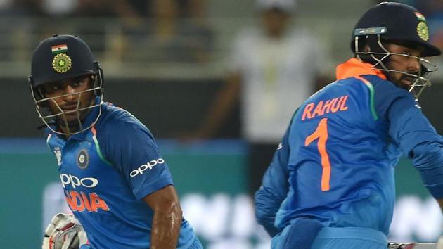 Indian batsman Lokesh Rahul (R) and Ambati Rayudu run between the wickets during the one day international (ODI) Asia Cup cricket match between Afghanistan and India at the Dubai International Cricket Stadium in Dubai on September 25, 2018. (Photo by ISHARA S. KODIKARA / AFP) (AFP)