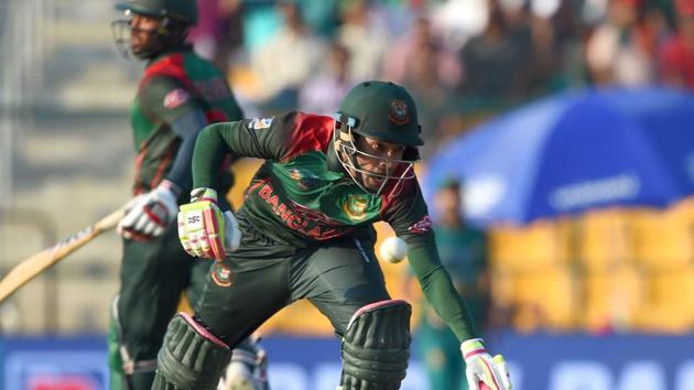 Bangladesh batsman Mushfiqur Rahim (R) and Mohammad Mithun run between the wickets during the one day international. (AFP)