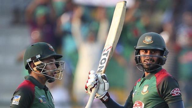 Bangladesh's Mohammad Mithun, right, celebrates with teammate Mushfiqur Rahim after scoring fifty runs during the one day international cricket match of Asia Cup between Pakistan and Bangladesh in Abu Dhabi, United Arab Emirates, Wednesday, Sept. 26, 2018. (AP Photo/Aijaz Rahi) (AP) Bangladesh's Mohammad Mithun, right, celebrates with teammate Mushfiqur Rahim after scoring fifty runs during the one day international cricket match of Asia Cup between Pakistan and Bangladesh in Abu Dhabi, United Arab Emirates, Wednesday, Sept. 26, 2018. (AP Photo/Aijaz Rahi) (AP)