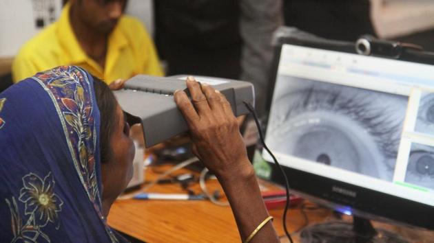 Keeping in view the larger public interest, collection of biometrics such as iris scan and fingerprints under Aadhaar program was a minimal invasion into the privacy rights, the court held.(HT File Photo)