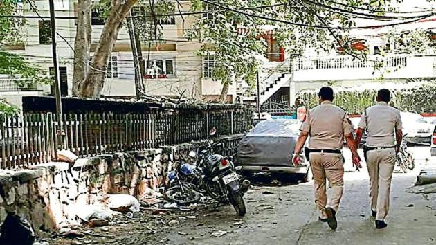 Police at the spot where 65-year-old Ram Bahadur Khatri was stabbed in the neck, allegedly by Benzi Singh.(Sourced)