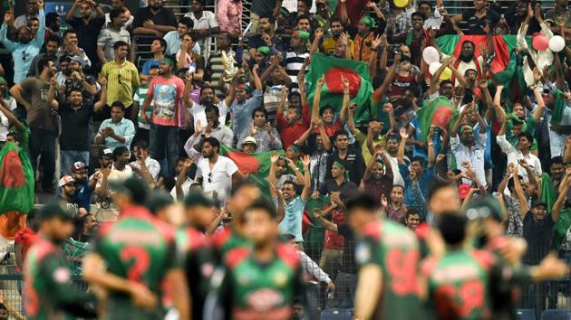 Bangladeshi cricket fans cheer during the one day international (ODI) Asia Cup cricket match between Bangladesh and Pakistan at the Sheikh Zayed Stadium in Abu Dhabi on September 26, 2018. (AFP) Bangladeshi cricket fans cheer during the one day international (ODI) Asia Cup cricket match between Bangladesh and Pakistan at the Sheikh Zayed Stadium in Abu Dhabi on September 26, 2018. (AFP)