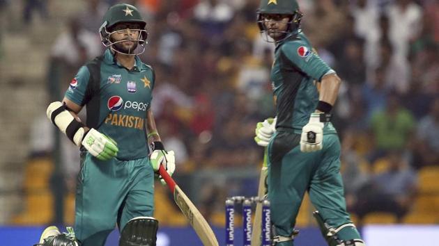 Pakistan's Imam-ul-Haq, left, and Shoaib Malik run between the wickets during the one day international cricket match. (AP)