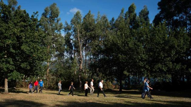 Pineiro, the doctor behind programme said that in the 21st century, people have forgotten they’re made to walk. Perched on the Atlantic coast of the Galicia region, the 40,000-strong town counts 9,000 overweight residents and another 3,000 who suffer from obesity. Known for its gastronomy and often gargantuan dishes, Galicia has Spain’s most overweight people, according to the Spanish Society of Cardiology. (Miguel Riopa / AFP) Pineiro, the doctor behind programme said that in the 21st century, people have forgotten they’re made to walk. Perched on the Atlantic coast of the Galicia region, the 40,000-strong town counts 9,000 overweight residents and another 3,000 who suffer from obesity. Known for its gastronomy and often gargantuan dishes, Galicia has Spain’s most overweight people, according to the Spanish Society of Cardiology. (Miguel Riopa / AFP)
