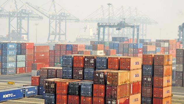 Aerial view from a crane, containers being off loaded from a ship to a truck and being taken to a warehouse at JNPT port.(PTI File Photo)