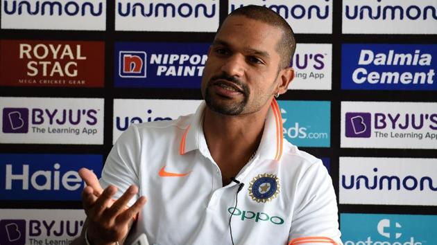 Indian cricketer Shikhar Dhawan speaks during a press conference in Dubai on September 27, 2018.(AFP)