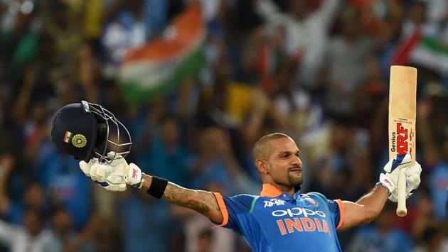 Shikhar Dhawan celebrates after scoring a century during the ODI Asia Cup cricket match between Pakistan and India at the Dubai International Cricket Stadium in Dubai, United Arab Emirates. (Ishara S. Kodikara / AFP)