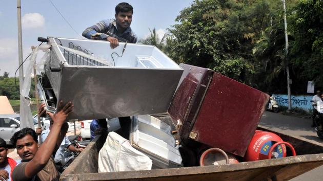 “The force of the water was tremendous and it was not easy even to walk. We called the fire brigade, but they came quite late. Till then we had evacuated most of the people. At some places, we literally broke the tin roofs and pulled out people, as the doors were jammed by the debris,” Datta Kasbe, a local resident said. (HT PHOTO) “The force of the water was tremendous and it was not easy even to walk. We called the fire brigade, but they came quite late. Till then we had evacuated most of the people. At some places, we literally broke the tin roofs and pulled out people, as the doors were jammed by the debris,” Datta Kasbe, a local resident said. (HT PHOTO)