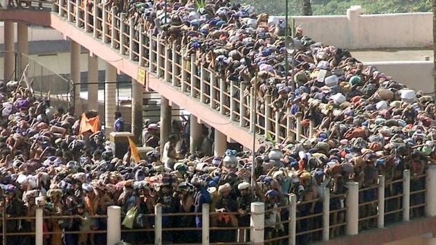 No woman can be stopped from entering Sabarimala temple, the Supreme Court ruled on Friday, ending a traditional ban on the entry of women between 10 and 50 years of age to the hilltop shrine in Kerala. “Religion can’t become a cover to exclude and deny basic right to worship... nor can physiology be a reason,” the top court’s five judge bench said in a 4:1 majority verdict. (Dipak Kumar / REUTERS File) No woman can be stopped from entering Sabarimala temple, the Supreme Court ruled on Friday, ending a traditional ban on the entry of women between 10 and 50 years of age to the hilltop shrine in Kerala. “Religion can’t become a cover to exclude and deny basic right to worship... nor can physiology be a reason,” the top court’s five judge bench said in a 4:1 majority verdict. (Dipak Kumar / REUTERS File)