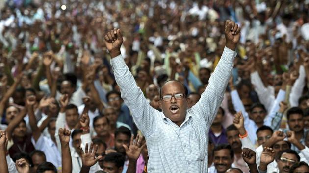 All India Fair Price Shop Dealers’ Federation members protest for completion of various demands, at Jantar Mantar in New Delhi, India. (Arun Sharma / PTI)