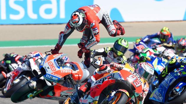 Ducati Team’s Spanish rider Jorge Lorenzo (C) falls during MotoGP race of the Moto Grand Prix of Aragon at the Motorland circuit in Alcaniz, Spain. (Jose Jordan / AFP) Ducati Team’s Spanish rider Jorge Lorenzo (C) falls during MotoGP race of the Moto Grand Prix of Aragon at the Motorland circuit in Alcaniz, Spain. (Jose Jordan / AFP)