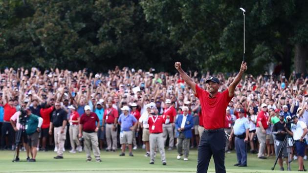 Tiger Woods of the United States celebrates making a par on the 18th green to win the TOUR Championship at East Lake Golf Club in Atlanta, Georgia. (Tim Bradbury / Getty Images North America / AFP) Tiger Woods of the United States celebrates making a par on the 18th green to win the TOUR Championship at East Lake Golf Club in Atlanta, Georgia. (Tim Bradbury / Getty Images North America / AFP)