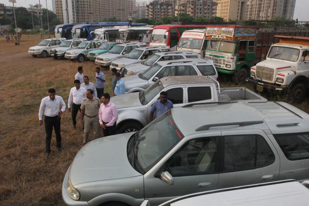 The 34 vehicles, which were seized by Thane crime branch, been kept on police ground on Friday.(Praful Gangurde/ HT)