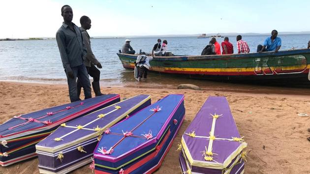 Volunteers arrange coffins containing the dead bodies of passengers retrieved after a ferry MV Nyerere overturned off the shores of Ukara Island in Lake Victoria, Tanzania. (Jackson Njehia / REUTERS) Volunteers arrange coffins containing the dead bodies of passengers retrieved after a ferry MV Nyerere overturned off the shores of Ukara Island in Lake Victoria, Tanzania. (Jackson Njehia / REUTERS)