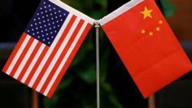 Chinese and US flags are set up for a signing ceremony during a visit by US Secretary of Transportation Elaine Chao at China's Ministry of Transport in Beijing, China on April 27. (REUTERS) Chinese and US flags are set up for a signing ceremony during a visit by US Secretary of Transportation Elaine Chao at China's Ministry of Transport in Beijing, China on April 27. (REUTERS)