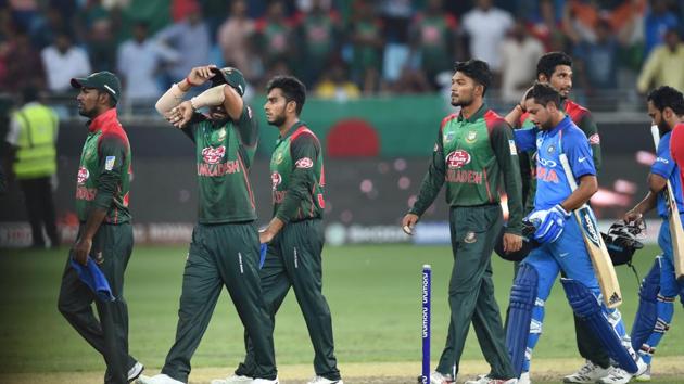 Bangladesh cricketers walk off the pitch after their loss against India in the Asia Cup Final. (AFP) Bangladesh cricketers walk off the pitch after their loss against India in the Asia Cup Final. (AFP)