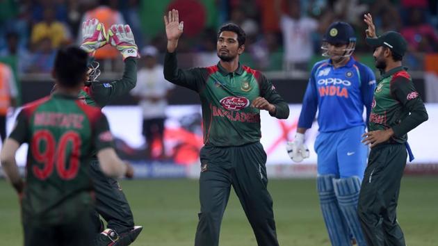 Bangladesh players celebrate the fall of an India wicket.(AFP) Bangladesh players celebrate the fall of an India wicket.(AFP)