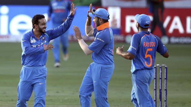 Indian players celebrate the fall of a Bangladesh wicket in the final of the Asia Cup on Friday.(AP)