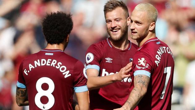 West Ham's Andriy Yarmolenko celebrates scoring their second goal with Felipe Anderson and Marko Arnautovic.(REUTERS)