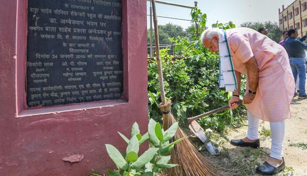 Prime Minister Narendra Modi undertakes a cleanliness drive under 'Swachhta Hi Sewa' campaign in the premises of Baba Sahib Ambedkar Higher Secondary School, in New Delhi, Sept 15 (PTI) Prime Minister Narendra Modi undertakes a cleanliness drive under 'Swachhta Hi Sewa' campaign in the premises of Baba Sahib Ambedkar Higher Secondary School, in New Delhi, Sept 15 (PTI)