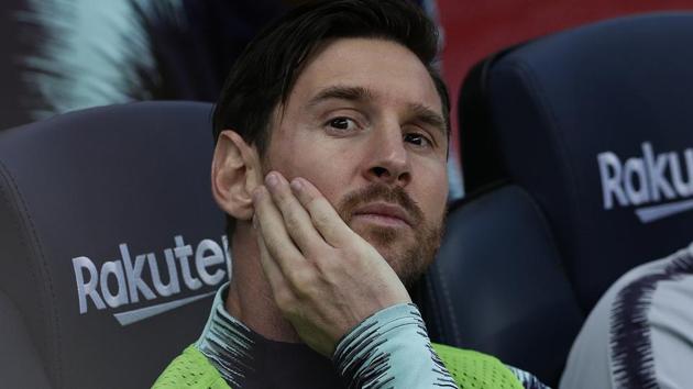 FC Barcelona's Lionel Messi sits on the bench prior of the Spanish La Liga soccer match between FC Barcelona and Athletic Bilbao.(AP)