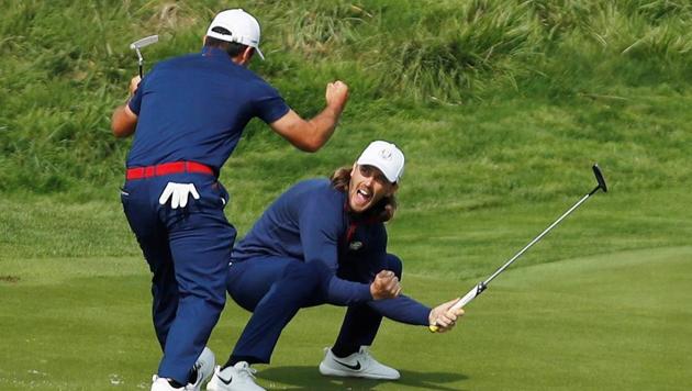 Team Europe's Francesco Molinari and Tommy Fleetwood celebrate. (REUTERS) Team Europe's Francesco Molinari and Tommy Fleetwood celebrate. (REUTERS)