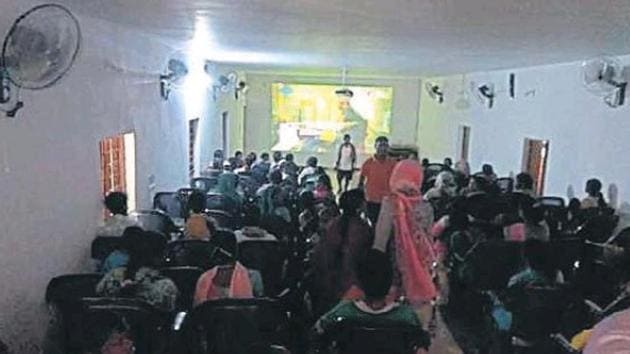 Tribals in Abhujmand experience big screen for the first time.(HT Photo) Tribals in Abhujmand experience big screen for the first time.(HT Photo)
