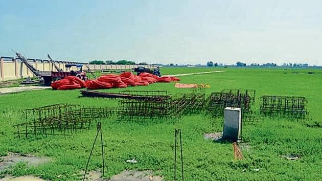 Construction material at the IIM site on the Amritsar-Jalandhar GT Road on Saturday. (HT Photo) Construction material at the IIM site on the Amritsar-Jalandhar GT Road on Saturday. (HT Photo)