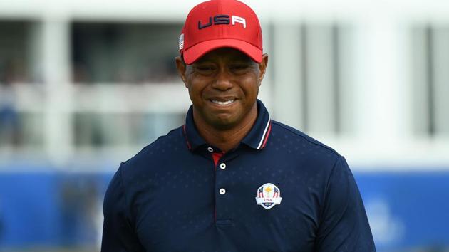 US golfer Tiger Woods reacts during his singles match with Europe's Spanish golfer Jon Rahm in Ryder Cup.(AFP)